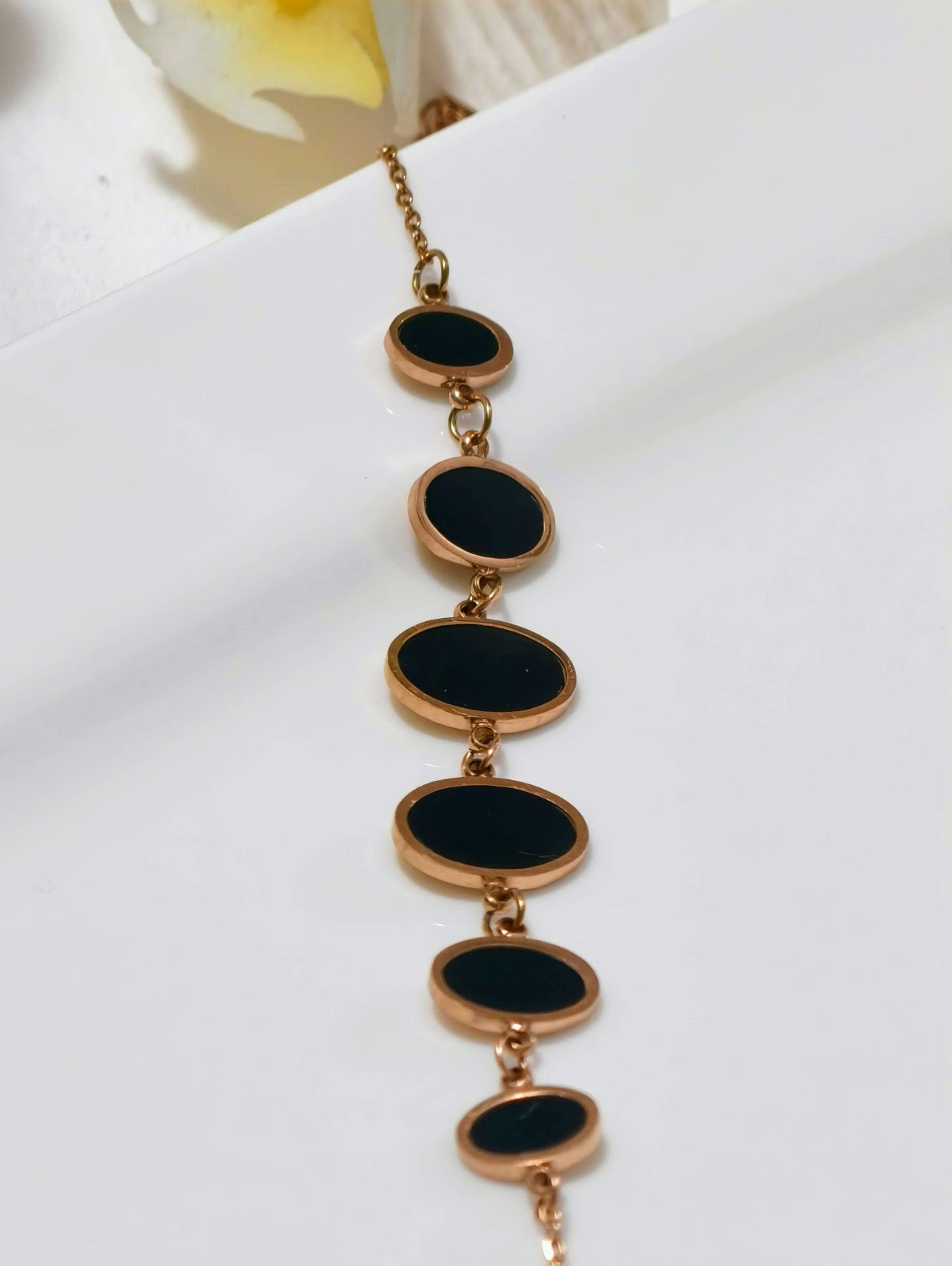 Elegant gold chain bracelet under 499 with black oval stones by ELL DESIGNS